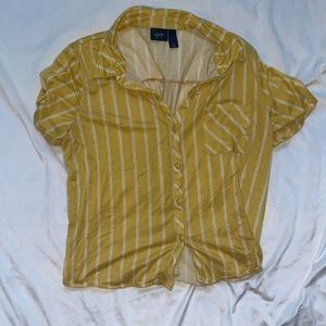 XL yellow button down. Fits like a medium